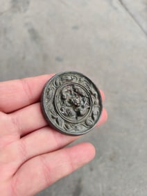 A Chinese Bronze Mirror
