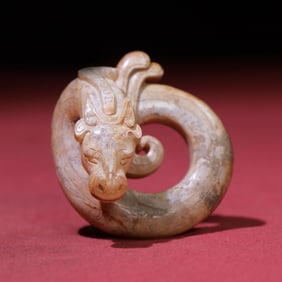 A Chinese Carved Jade Dragon Pendant