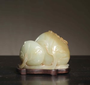 A Chinese Carved Jade Peach Decoration