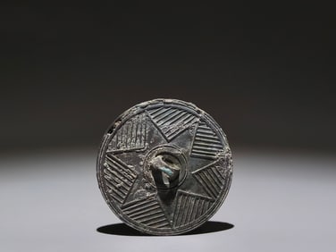 A Chinese Bronze Mirror