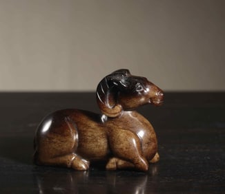 A Chinese Carved Jade Goat Statuette