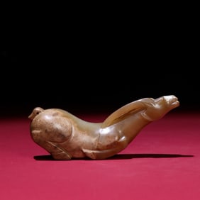 A Chinese Carved Jade Goat Pendant