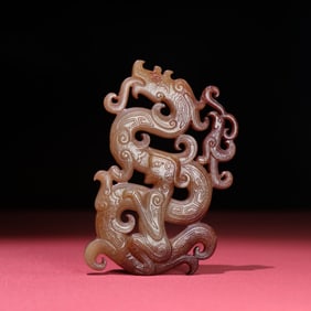 A Chinese Carved Jade Dragon Pendant