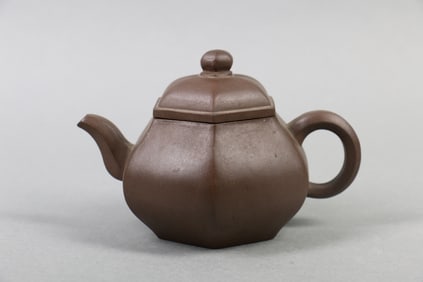 A Chinese Carved Clay Tea Pot with Lid