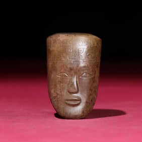 A Chinese Carved Jade Head Pendant