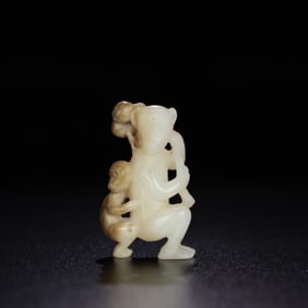 A Chinese Carved Jade Monkey Statuette