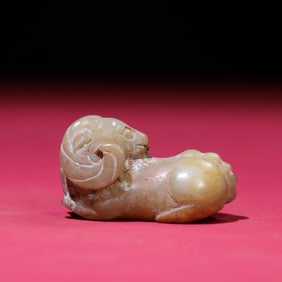 A Chinese Carved Jade Goat Statuette