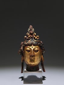 A Chinese Gilt Bronze Buddha Top