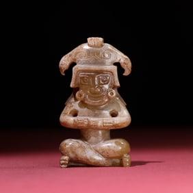 A Chinese Carved Jade Figure of Buddha