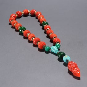A Chinese Carved Coral Prayers Beads