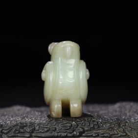 A Chinese Carved Jade Bird Statuette