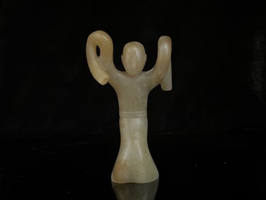 A Chinese Carved Jade Dancer