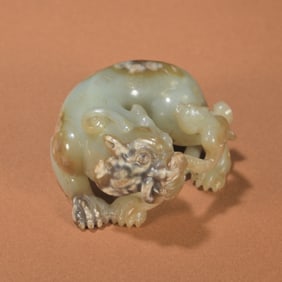 A Chinese Carved Jade Foo-Dog Statuette