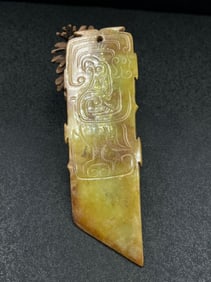 A Chinese Carved Jade Dragon Pendant