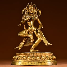 A Chinese Gilt Bronze Figure of Buddha