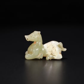 A Chinese Carved Jade Foo-Dog Statuette