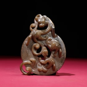 A Chinese Carved Jade Dragon Pendant