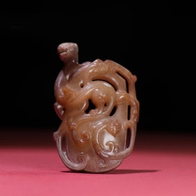 A Chinese Carved Jade Dragon Pendant