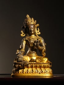 A Chinese Gilt Bronze Figure of Buddha