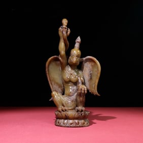 A Chinese Carved Jade Figure of Buddha