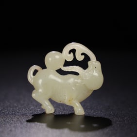 A Chinese Carved Jade Bull Statuette