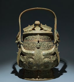 A Chinese Bronze Water Pot with Handle