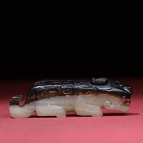 A Chinese Carved Jade Tiger Pendant