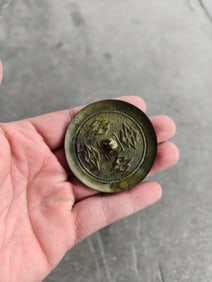 A Chinese Bronze Mirror