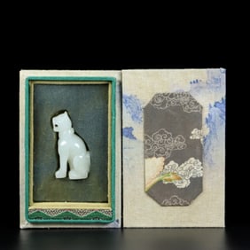 A Chinese Carved Jade Dog Statuette