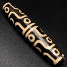 A Chinese Carved Agate Wine DZI Bead