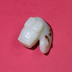 A Chinese Carved Jade Dragon Statuette