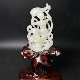 A Chinese Carved Jade Figure of Musician