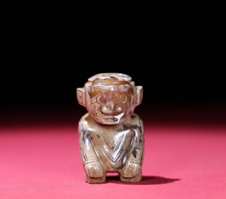 A Chinese Carved Jade Figure of Man