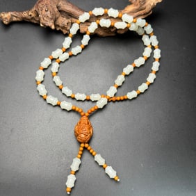 A Chinese Carved Jade Necklace