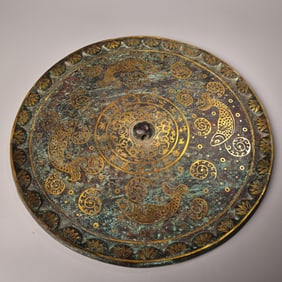 A Chinese Gilt Bronze Mirror