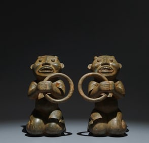 A Pair of Chinese Bronze Figures of Kneeling Man