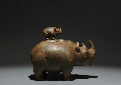 A Chinese Bronze Rhino Statuette