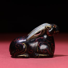 A Chinese Carved Jade Goat Statuette