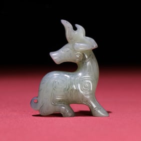A Chinese Carved Jade Deer Statuette