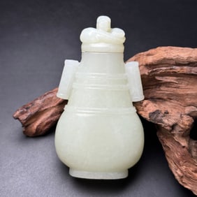 A Chinese Carved Jade Bottle