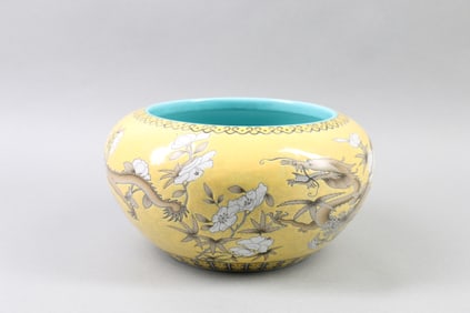 A Chinese Yellow Ground Famille-Rose Porcelain Jar