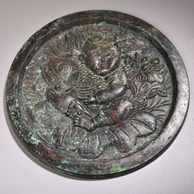 A Chinese Bronze Mirror