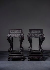 A Pair of Chinese Carved Hardwood Stands