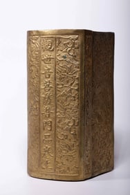 A Chinese Gilt Bronze Figure of Buddhist Scripture Case
