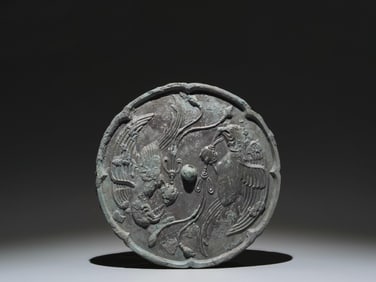 A Chinese Bronze Mirror