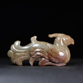 A Chinese Carved Jade Phenix Statuette