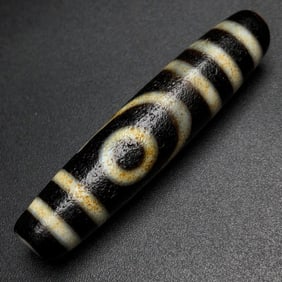 A Chinese Carved Agate DZI Bead