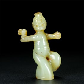 A Chinese Carved Jade Figure of Dancer