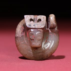 A Chinese Carved Jade Dragon Statuette
