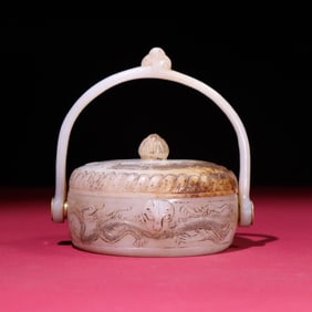 A Chinese Carved Jade Food Box with Lid and Handle